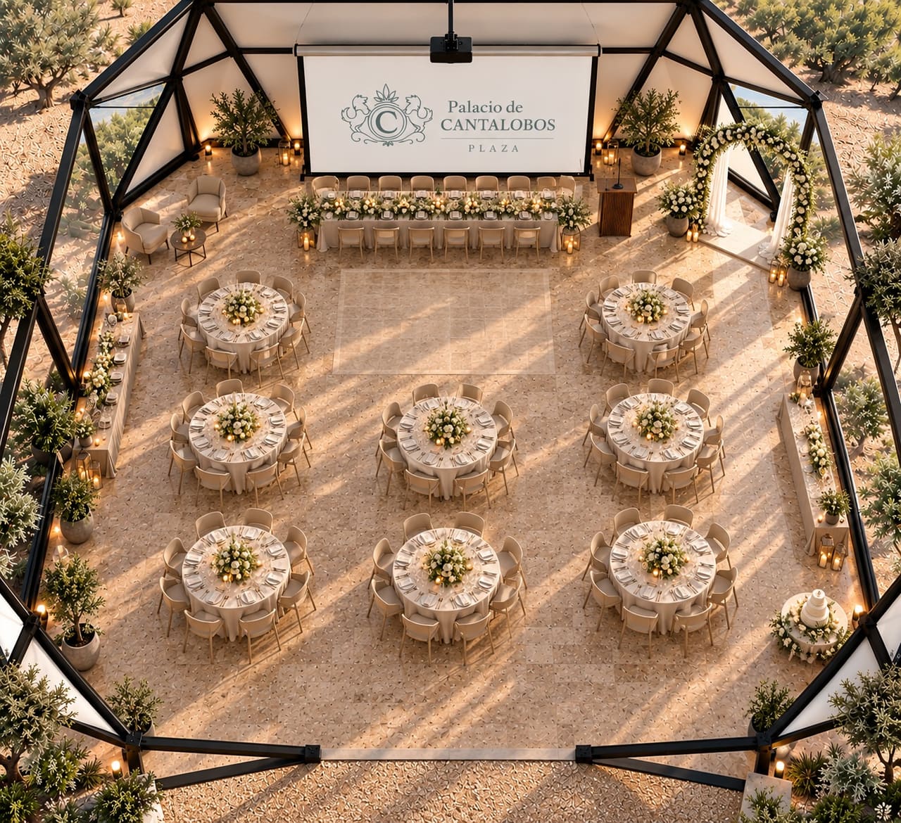 The Plaza seen from above, set for a wedding: round tables with flowers, a long table for the couple, a dance floor and a flower arch.