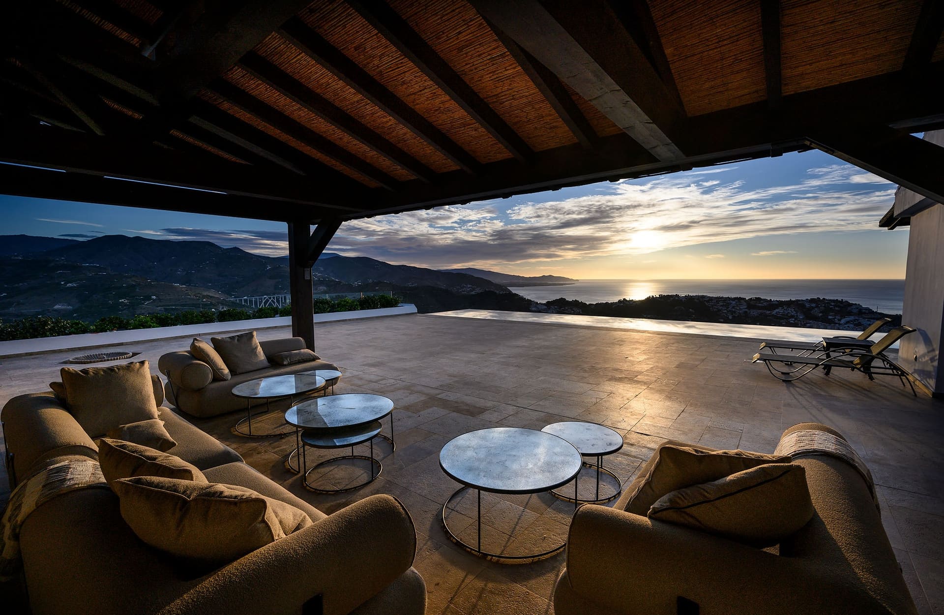 The covered terrace at El Cortijo at sunset.