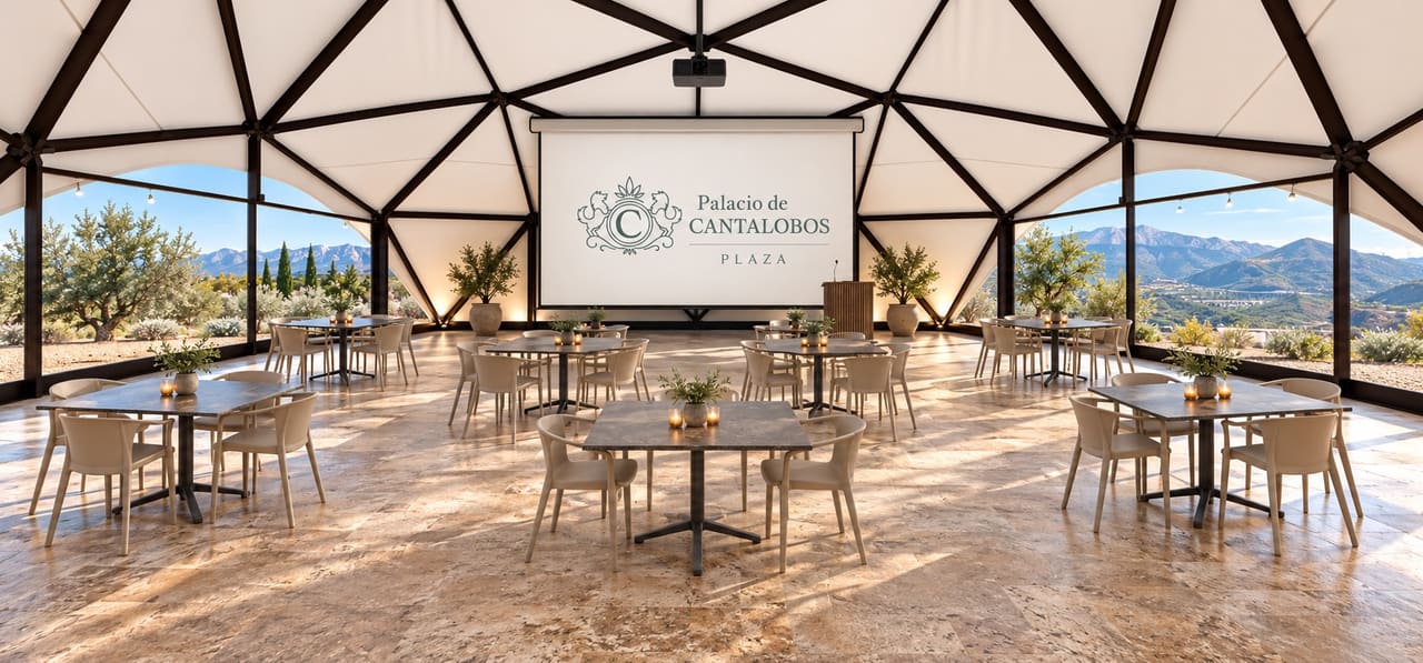The Plaza set up for a conference, tables facing a screen.